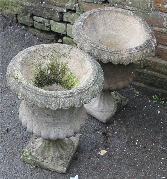 Pair reconstituted stone garden urns